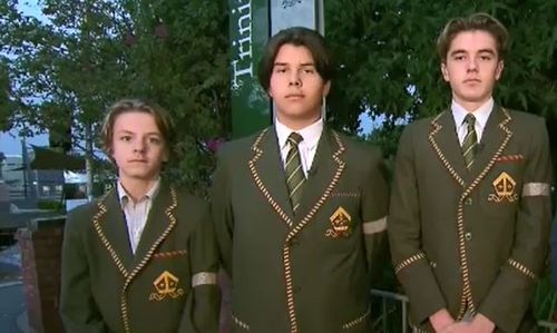 Students today wore brown bands around their arms for their the much-loved principal. (9NEWS)