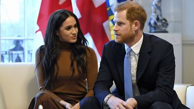 Britain's Prince Harry and Meghan, Duchess of Sussex gesture during their visit to Canada House in thanks for the warm Canadian hospitality and support they received during their recent stay in Canada, in London, Tuesday, Jan. 7, 2020