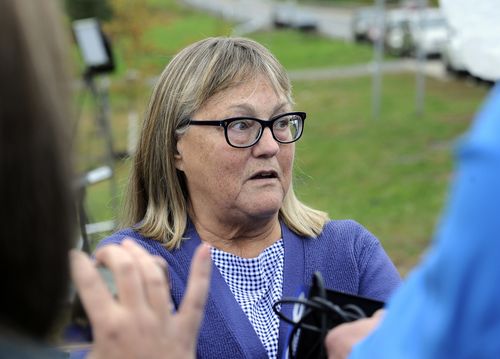 Barbara Douglas, of Danamora, N.Y., talks to reporters about her four family members who died in Saturday's fatal limousine crash in Schoharie