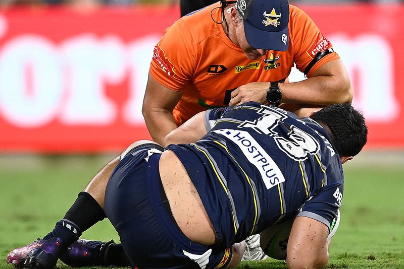  Jason Taumalolo of the Cowboys lays on the ground after being injured