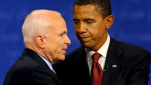 McCain pictured with Barack Obama. 