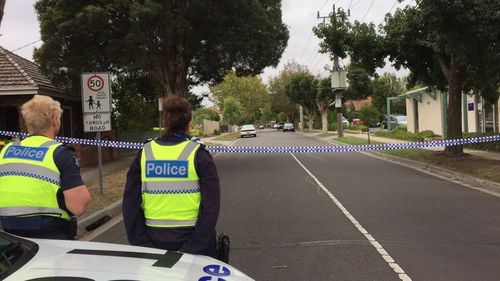 Police at the scene in April.