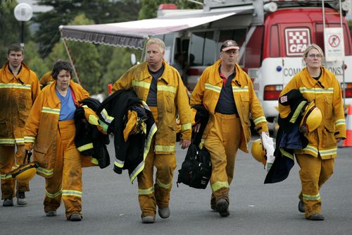 Country Authority Firefighters return to the Churchill Staging Area from an overnight shift mopping up after fires in the Strzelecki Ranges in Gippsland, Victoria.