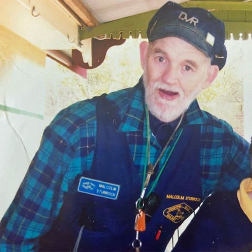 Malcolm, pictured at the Diamond Valley Railway, where he volunteered for more than 30 years.