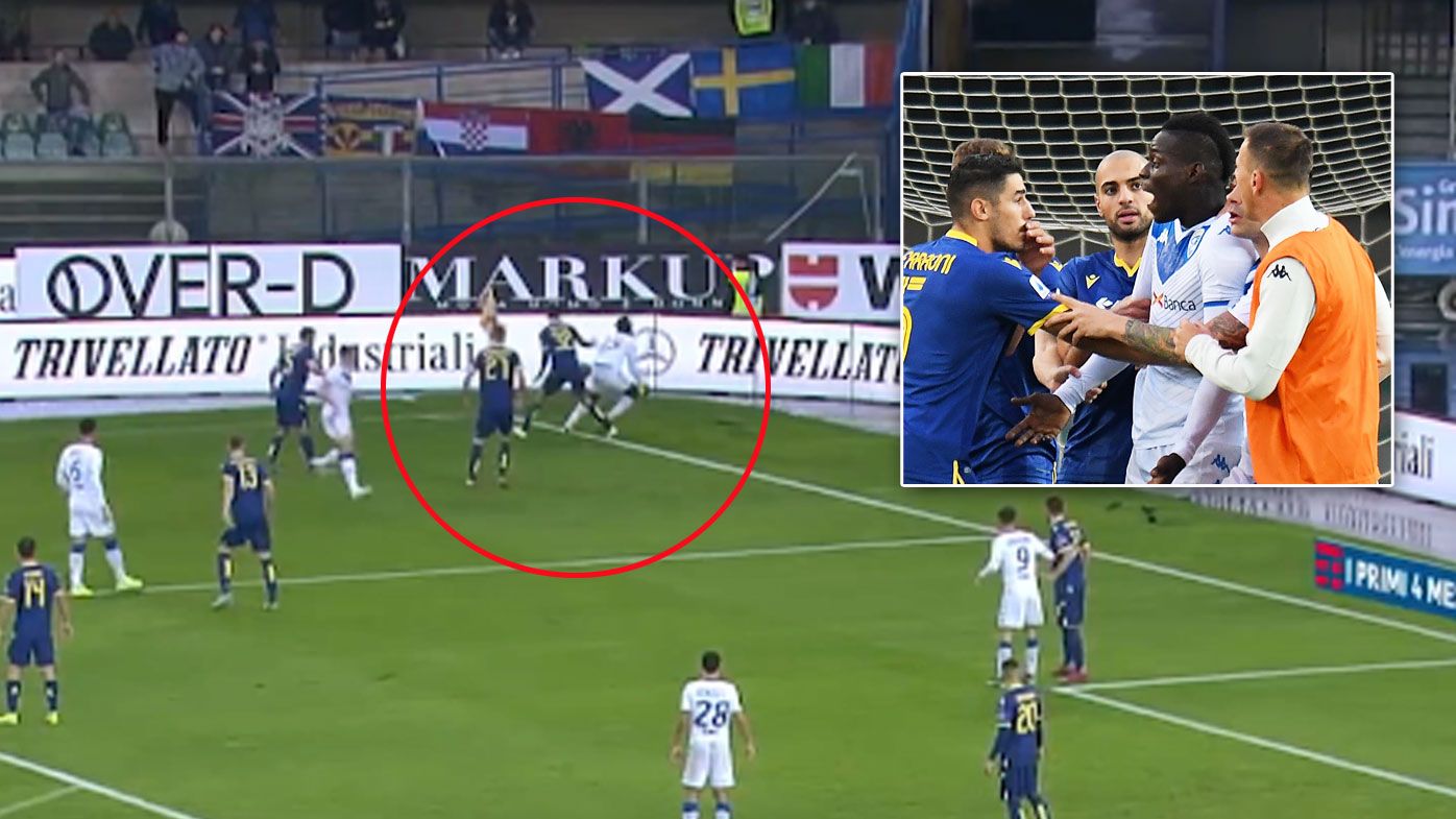 Balotelli kicks the ball after racist chants