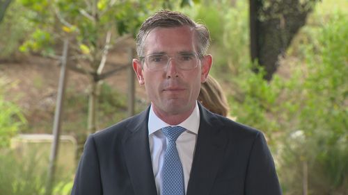 People who fail to register a positive rapid antigen test result on the Service NSW app will be fined $1000, NSW Premier Dominic Perrottet has said.