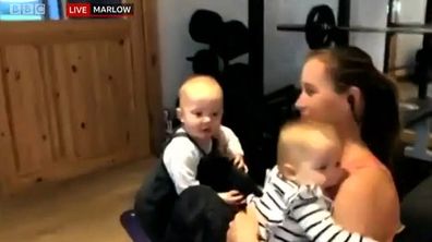 Rowing champion upstaged by her three toddlers during live TV segment