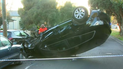 The upturned stolen vehicle that caused an almighty smash in Warburton Road, Canterbury, early this morning.