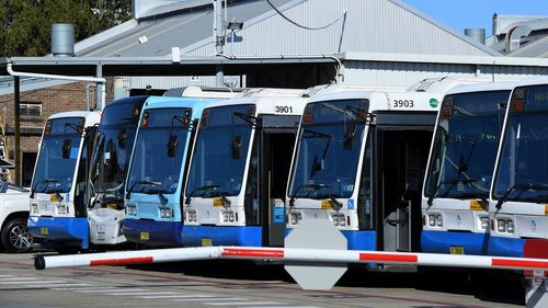 Buses at the Burwood bus depot. Public bus transport on some routes has been impacted after bus drivers and depot workers have had to go into isolation following COVID-19 cases being detected at the Leichhardt Depot. Burwood, NSW. 12th August, 2021. Photo: Kate Geraghty