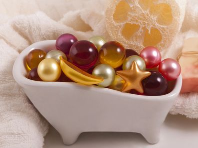 Bath oil pearls in a small dish