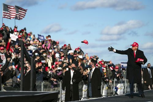 President Donald Trump arrives for a campaign rally at Wilkes-Barre Scranton International Airport