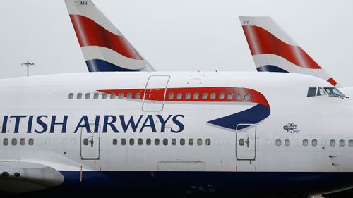 British Airways planes are parked at Heathrow Airport in London