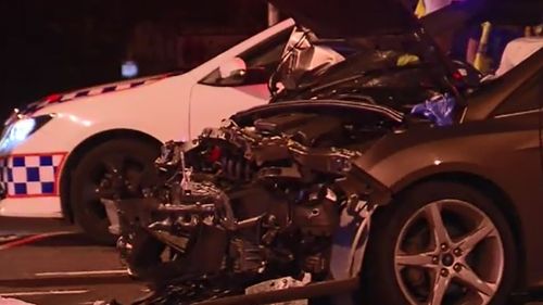 Police believe the car and motorbike collided about 6.40pm. (9NEWS)