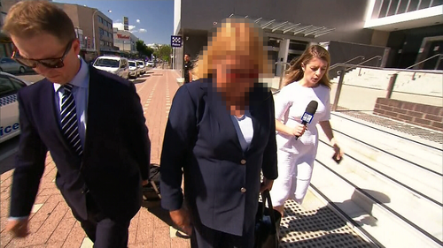 A Sydney teacher has faced court accused of grabbing, punching, scratching and pushing young students at a school in the city's south-west.