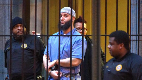 Officials escort "Serial" podcast subject Adnan Syed 