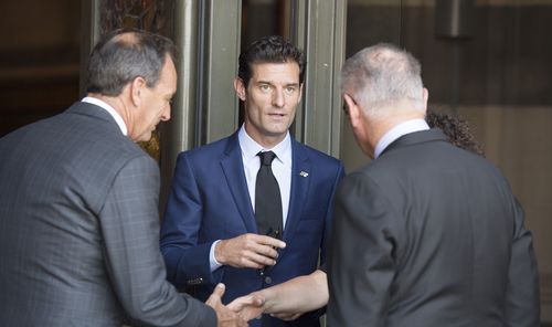 Former F1 driver Mark Webber (centre) arrives for the state funeral service for Ron Walker. (AAP)