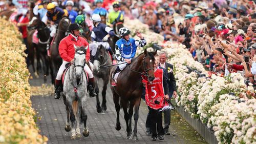 Ryan Moore riding Protectionist returns after winning the Emirates Melbourne Cup. (Getty)