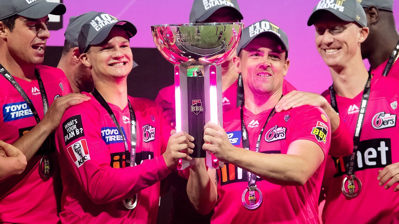 Sydney Sixers players celebrate their win in BBL10.