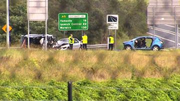 The three-vehicle crash happened in the Centenary Highway at Springfield.