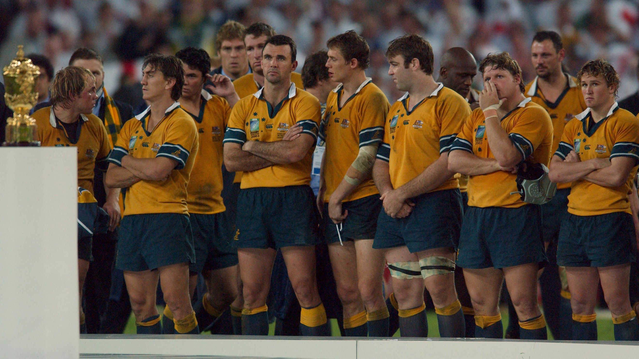 Dejected Wallabies look at what could have been during the trophy presentation.