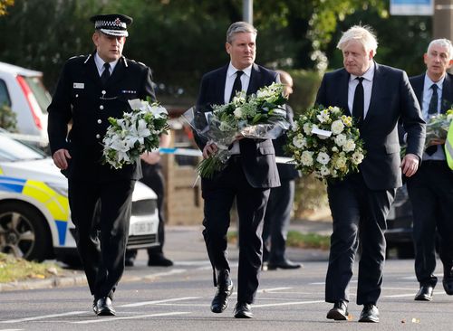 Boris Johnson, Keir Starmer and Ben-Julian Harrington carry floral tributes to scene of Sir David Amess fatal stabbing