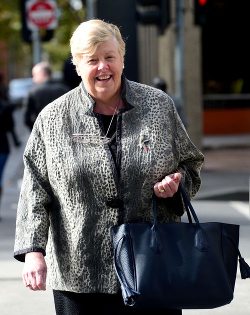 The post also referenced former Police Commissioner Christine Nixon, pictured here leaving court in 2016 after suing Mr Mullet over his claims she tried to ruin his career. (AAP) 