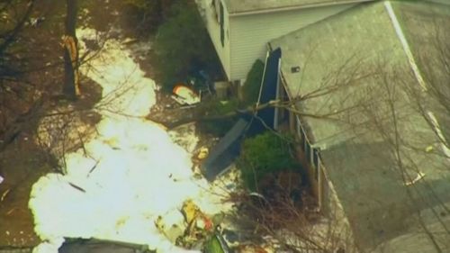 Six dead after private jet crashes into Washington home