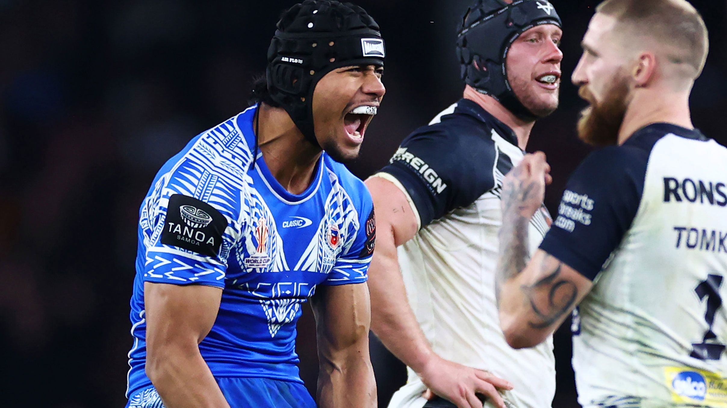 Stephen Crichton celebrates after kicking a drop goal, leading to Samoa winning against England in the Rugby League World Cup semi-final.