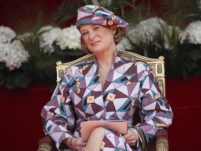 Belgium's Princess Delphine watches the National Day Parade from the podium in front of the Royal Palace in Brussels, Wednesday, July 21, 2021. Belgium celebrates its National Day on Wednesday in a scaled down version due to coronavirus, COVID-19 measures. (AP Photo/Olivier Matthys)