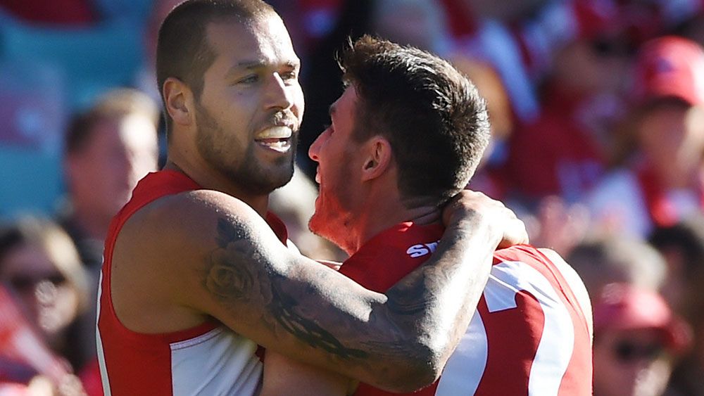 Swans hang on to beat Carlton in AFL