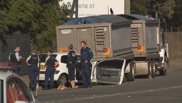 Boy dies after car crash with parked truck and trailer 