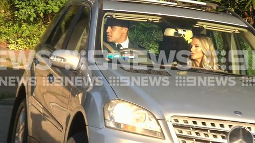 Walker and his fiancee leaving their Dee Why home this morning.