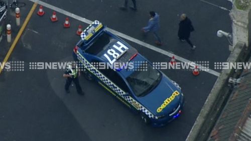 Police trailed the allegedly stolen car for around an hour before arresting five men. (9NEWS)