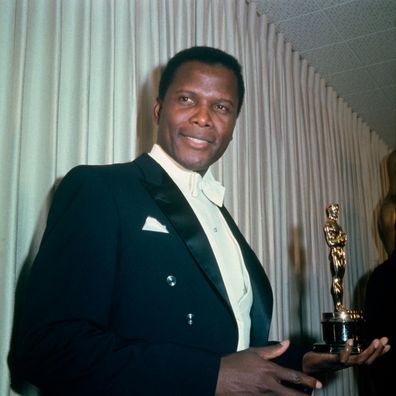 Sidney Poitier winning his Oscar in 1964