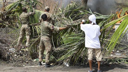 Army Commandos deliver aid and provide support to British Virgin Islands communities on the island of Tortola. (AAP)