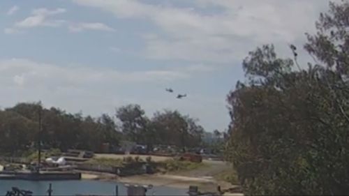 An inquest into the Sea World helicopter crash has been shown several videos of the moment the aircraft collided.