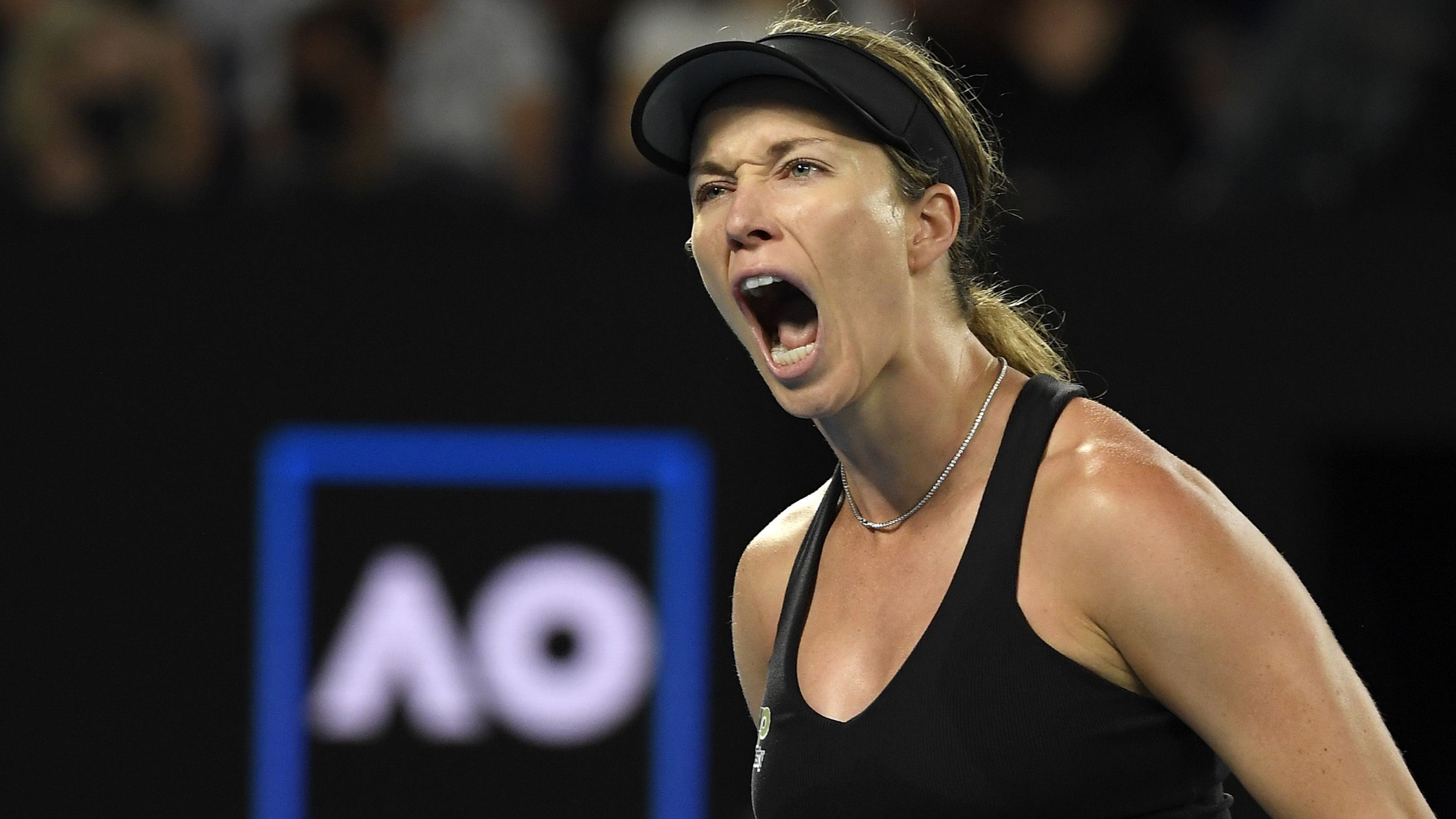 Danielle Collins celebrates after winning a point against Ash Barty during the women&#x27;s singles final at the Australian Open.