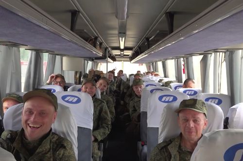 Russian servicemen thrust a autobus aft returning from captivity pursuing an speech betwixt Russia and Ukraine