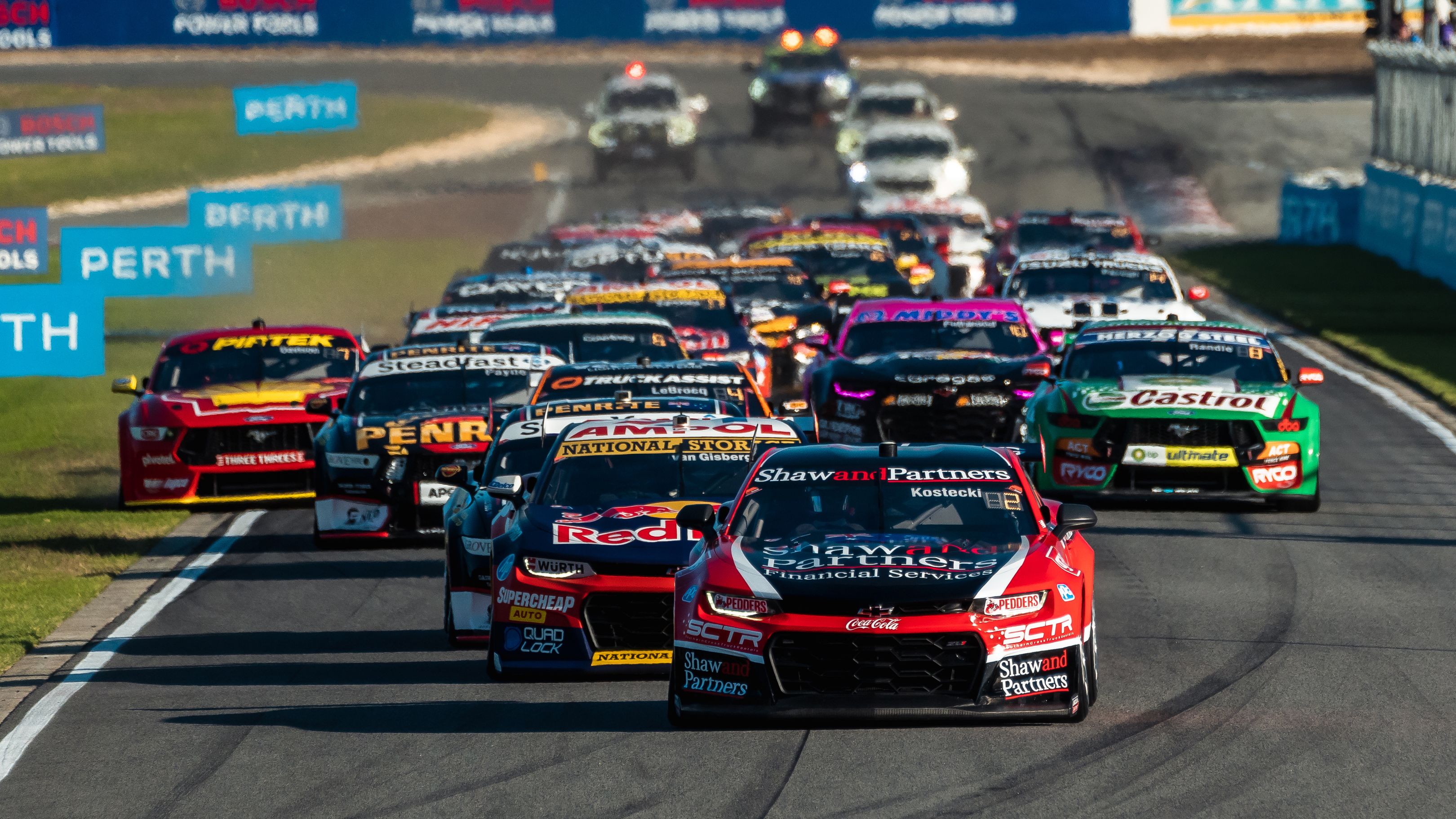 Brodie Kostecki leads the Supercars field into turn one at Wanneroo Raceway.