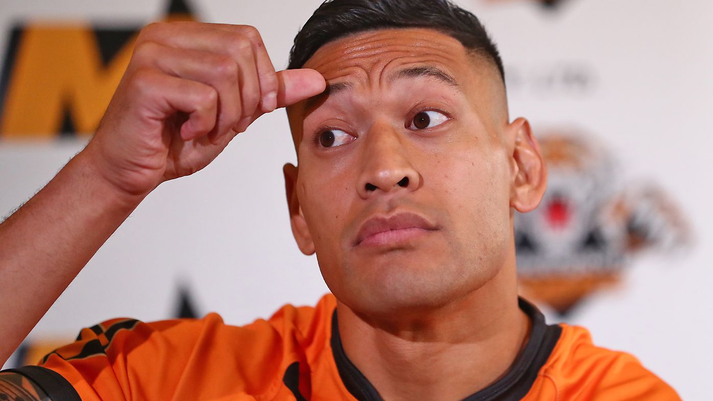 Israel Folau speaks to the media during a press conference 
