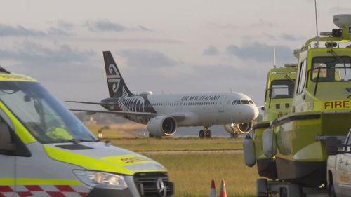 Emergency services are being stood down after a flight from New Zealand was grounded at Sydney Airport reportedly due to an unknown safety threat. ﻿Flight NZ-247 arrived from Wellington at about 5.30pm with tactical operations unit, paramedics and firefighters all called to the scene.