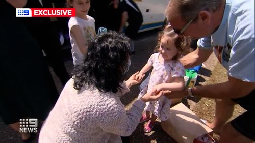 The family fled their home country, leaving the capital city of Kyiv in a small car, as the sound of shelling continued around them.