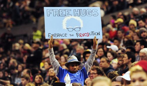 Devonte Hart was 11 years old when he held a sign that said 'Free Hugs'. (AAP)