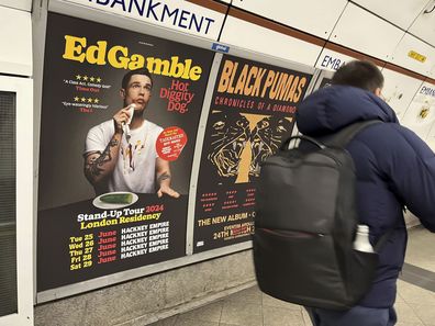 A  view of a poster advertising comedian Ed Gamble's Hot Diggity Dog tour on the Bakerloo line platform at Embankment underground station in London, Wednesday March 27, 2024. 
