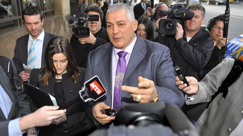 Gangland figure Mick Gatto leaves the Melbourne Magistrates Court surrounded by media in 2010. Gatto was appearing in court on drink driving charges.
