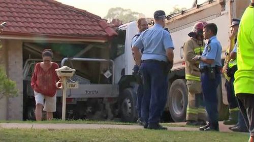 The truck pushed Mr Atwood's ute into the garage before colliding with a brick pillar.