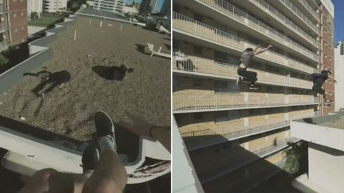 The potentially fatal stunt shows four young men on a Gold Coast rooftop leaping between high rises without a safety net. Picture: 9NEWS