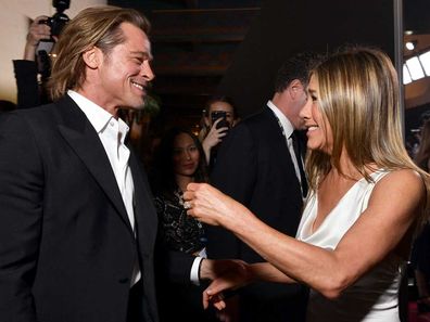 Brad Pitt and Jennifer Aniston cross paths on the SAG red carpet.