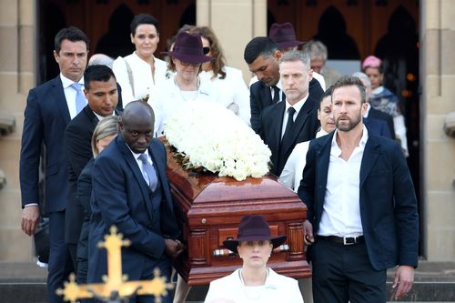 Pallbearers carry the casket of Les Murray following his State Funeral at St Mary's Cathedral. (AAP)