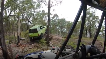 Two men have been fined after they filmed themselves driving through protected areas in Queensland.
